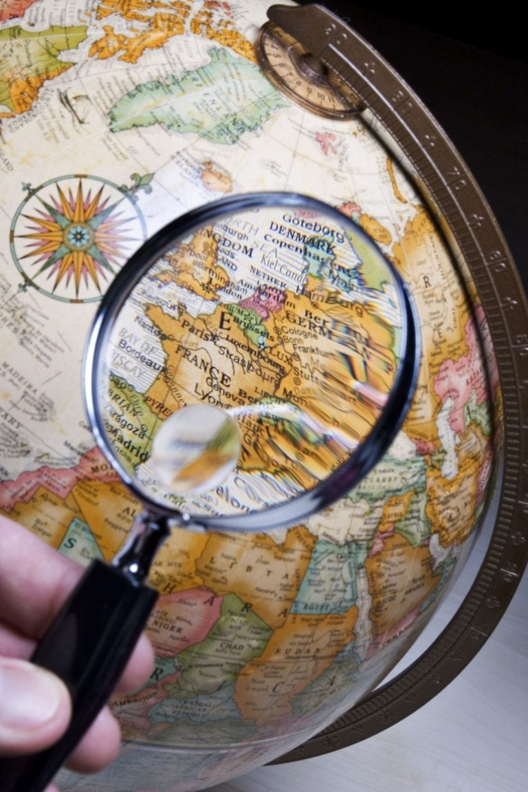 591650 - globe and magnifying glass